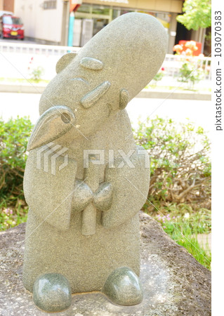 Stone statues of the seven deities of good fortune Cute two-headed old man 103070383
