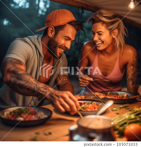 A couple enjoying camping 103071033