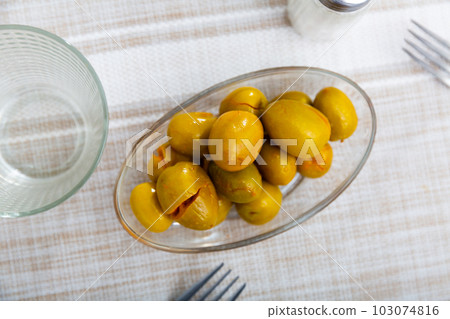 Bunch of green olives on table Bunch of green olives on table 103074816