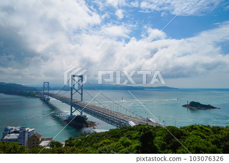 View of Onaruto Bridge and Naruto Strait from Narutoyama Observatory on a summer day 103076326