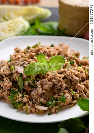 Local Thai food, Spicy minced pork salad (Larb Moo) Local Thai food, Spicy minced pork salad (Larb Moo) 103077271