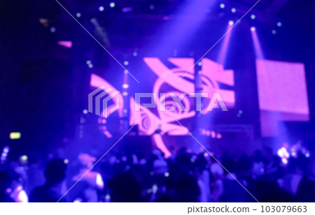 DJ turns music people dancing in night club photo blur DJ turns music people dancing in night club photo blur 103079663