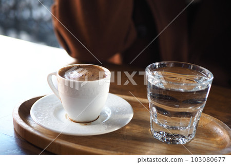 a cup of turkish coffee on table outdoor a cup of turkish coffee on table outdoor 103080677