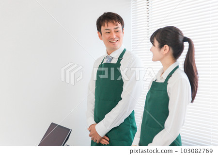Male and female clerk who serves customers and cashiers at convenience stores, supermarkets, and shops Male and female clerk who serves customers and cashiers at convenience stores, supermarkets, and shops 103082769