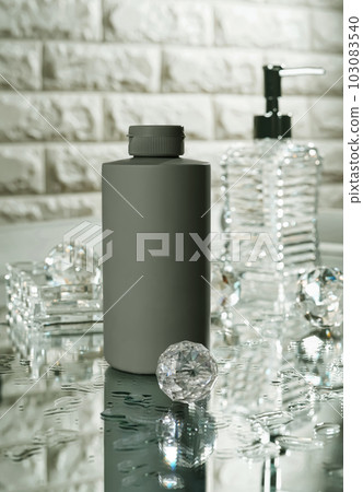 Unbranded blank cosmetics, soap, skincare, cream and shampoo packaging on a fresh background. Skincare female and male skincare products packaging on photo studio Unbranded blank cosmetics, soap, skincare, cream and shampoo packaging on a fresh background. Skincare female and male skincare products packaging on photo studio 103083540