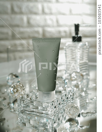 Unbranded blank cosmetics, soap, skincare, cream and shampoo packaging on a fresh background. Skincare female and male skincare products packaging on photo studio Unbranded blank cosmetics, soap, skincare, cream and shampoo packaging on a fresh background. Skincare female and male skincare products packaging on photo studio 103083541