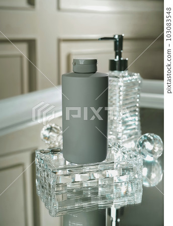Unbranded blank cosmetics, soap, skincare, cream and shampoo packaging on a fresh background. Skincare female and male skincare products packaging on photo studio Unbranded blank cosmetics, soap, skincare, cream and shampoo packaging on a fresh background. Skincare female and male skincare products packaging on photo studio 103083548