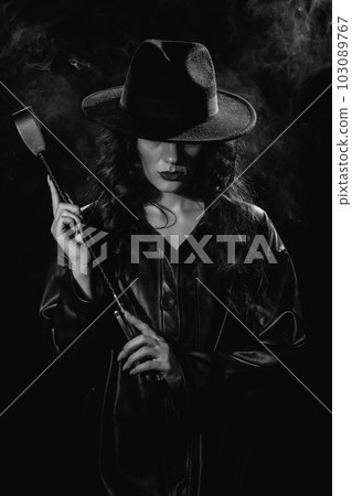 Sexy female dominant mistress with a whip flogger for BDSM sex 103089767