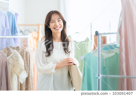 young woman shopping in a store young woman shopping in a store 103091407