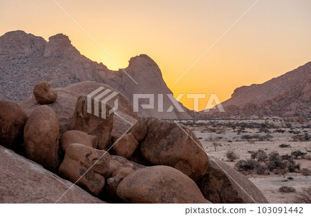 The Spitzkoppe area around sunset The Spitzkoppe area around sunset 103091442