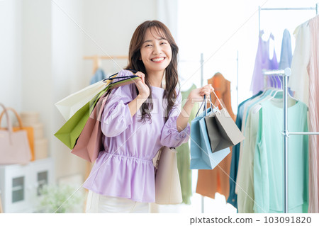 young woman shopping in a store young woman shopping in a store 103091820
