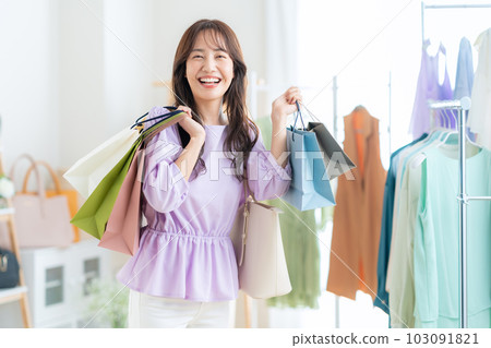 young woman shopping in a store young woman shopping in a store 103091821