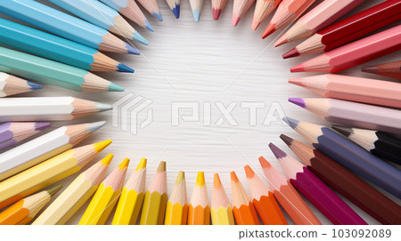 Many colored pencils in circle. School stationery drawing equipment tools. Kids creative art various multicolor wooden pencils top view close up photo 103092089