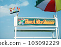 beach umbrella and sign 103092229