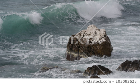 stormy mediterranean sea crushing over rock stormy mediterranean sea crushing over rock 103092623