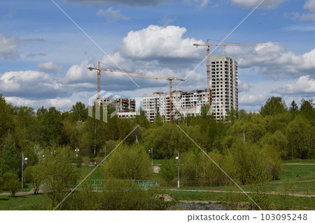Moscow, Russia - 4 May.2023. Liebherr cranes build residential buildings in Zelenograd 103095248
