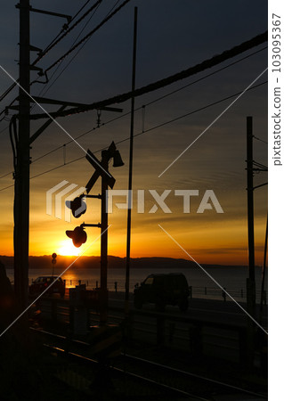 railroad crossing and sunrise 103095367