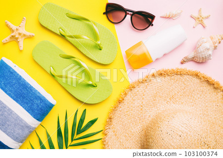 Summer vacation concept flat lay. beach accessories and towel top view. Space for text. travel concept Summer vacation concept flat lay. beach accessories and towel top view. Space for text. travel concept 103100374