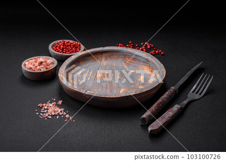 Empty wooden plate, knife, fork and cutting board 103100726