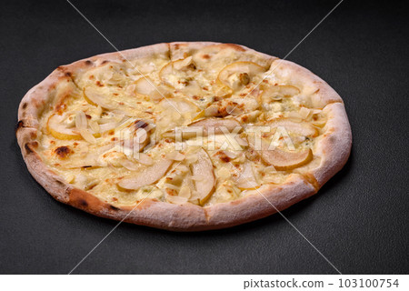 Delicious sweet pizza with pear, dorblu cheese and nuts 103100754