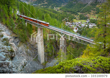 Zermatt, Switzerland. Gornergrat train on bridge 103100979