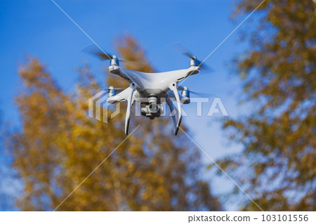 in-flight drone quadrocopter with digital camera 103101556