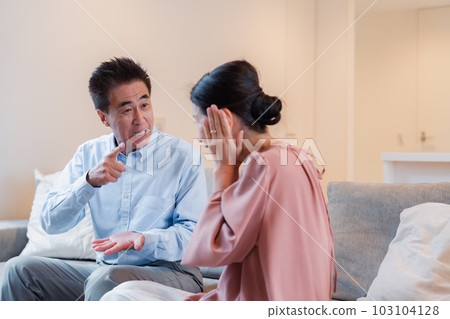 Senior couple having a fight at home Senior couple having a fight at home 103104128