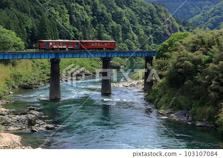Fresh green Nagara River and Nagara River Railway Fresh green Nagara River and Nagara River Railway 103107084