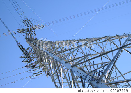 Power transmission tower in the blue sky Power transmission tower in the blue sky 103107369