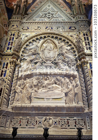 Death and Assumption of the Virgin, detail from the Tabernacle of the Madonna, by Andrea di Cione known as l'Orcagna, marble and mosaic. Loggia of the Orsanmichele Church in Florence, Tuscany, Italy Death and Assumption of the Virgin, detail from the Tabernacle of the Madonna, by Andrea di Cione known as l'Orcagna, marble and mosaic. Loggia of the Orsanmichele Church in Florence, Tuscany, Italy 103108673