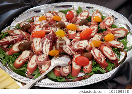 Classic Croatian starter plate with fine Croatian ham and cheese Classic Croatian starter plate with fine Croatian ham and cheese 103109328