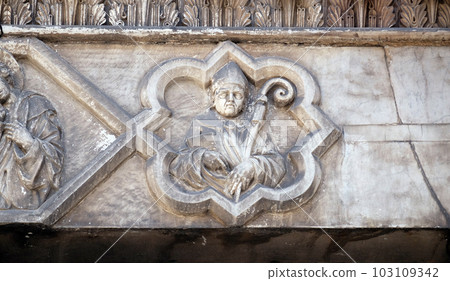 Saints on the portal of the Cathedral of S.Martino in Lucca, Italy 103109342