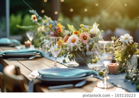 Romantic table setting with candles and flowers 103110223