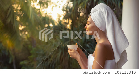 Good Morning of Woman With a Cup of Coffee After Shower on Terrace 103112319