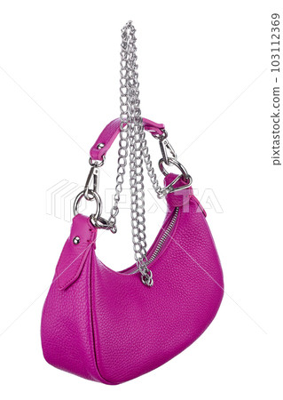 Elegant miniature women's handbag made of genuine leather in electric pink color, with a chain strap and handle, isolated on a white background. Side view. Elegant miniature women's handbag made of genuine leather in electric pink color, with a chain strap and handle, isolated on a white background. Side view. 103112369