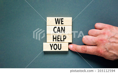 Support and we can help you symbol. Concept words We can help you on wooden blocks. Beautiful grey table grey background. Businessman hand. Business psychological we can help you concept. Copy space Support and we can help you symbol. Concept words We can help you on wooden blocks. Beautiful grey table grey background. Businessman hand. Business psychological we can help you concept. Copy space 103112594