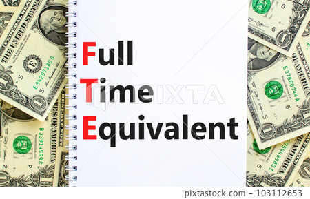 FTE Full time equivalent symbol. Concept words FTE Full time equivalent on white note. Dollar bills. Beautiful background from dollar bills. Business and FTE Full time equivalent concept. Copy space. FTE Full time equivalent symbol. Concept words FTE Full time equivalent on white note. Dollar bills. Beautiful background from dollar bills. Business and FTE Full time equivalent concept. Copy space. 103112653