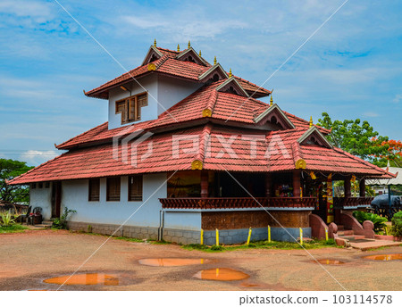 Traditional tiled roof house in Kerala, India Traditional tiled roof house in Kerala, India 103114578