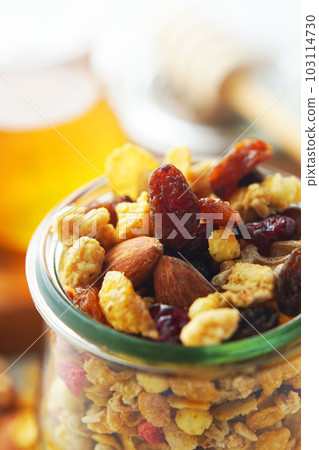 fruit granola and honey 103114730