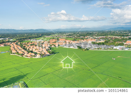 Green fields and dream house in aerial view. 103114861