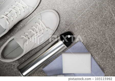 White leather shoe cleaning kit - water-repellent spray, foam, rag and sponge, copy space, place for text White leather shoe cleaning kit - water-repellent spray, foam, rag and sponge, copy space, place for text 103115992