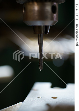 Threading with a Tapping Drilling Machine 103119131