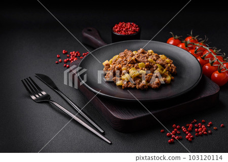 Tasty dish consisting of zucchini, beef meat, mushrooms, onions and garlic Tasty dish consisting of zucchini, beef meat, mushrooms, onions and garlic 103120114