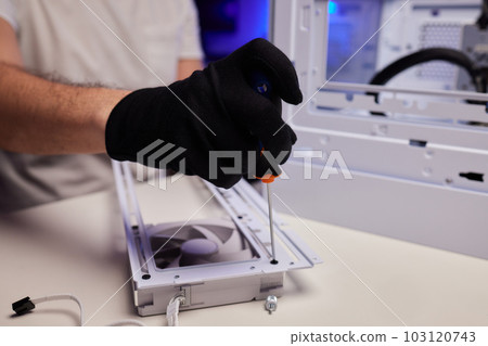 Computer technician installs cooling system of computer. 103120743