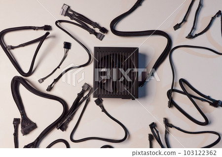 Computer part for system unit assembly, power supply for computer close-up, choice of quiet silent reliable power supply, close up. 103122362