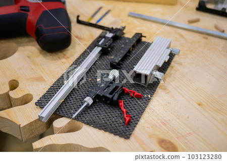Set of carving tools, carpenter equipment on table in workshop Set of carving tools, carpenter equipment on table in workshop 103123280