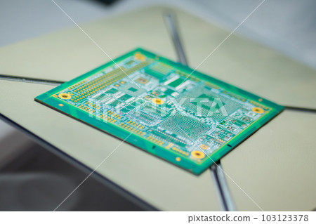 Green computer printed circuit board - close up view Green computer printed circuit board - close up view 103123378