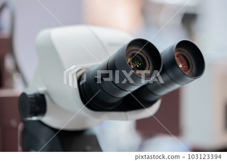 Close up view: ocular lens, eyepieces of optical microscope Close up view: ocular lens, eyepieces of optical microscope 103123394