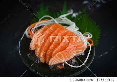 fresh raw salmon fish for cooking food seafood salmon fish, salmon sashimi food salmon fillet japanese menu with shiso perilla leaf lemon herb and spices 103128449