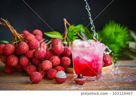 lychees on table, fresh ripe lychee fruit tropical fruit lychee juice drink with sweet soda in glass - lychee smoothie food and drink fruit juice 103128467